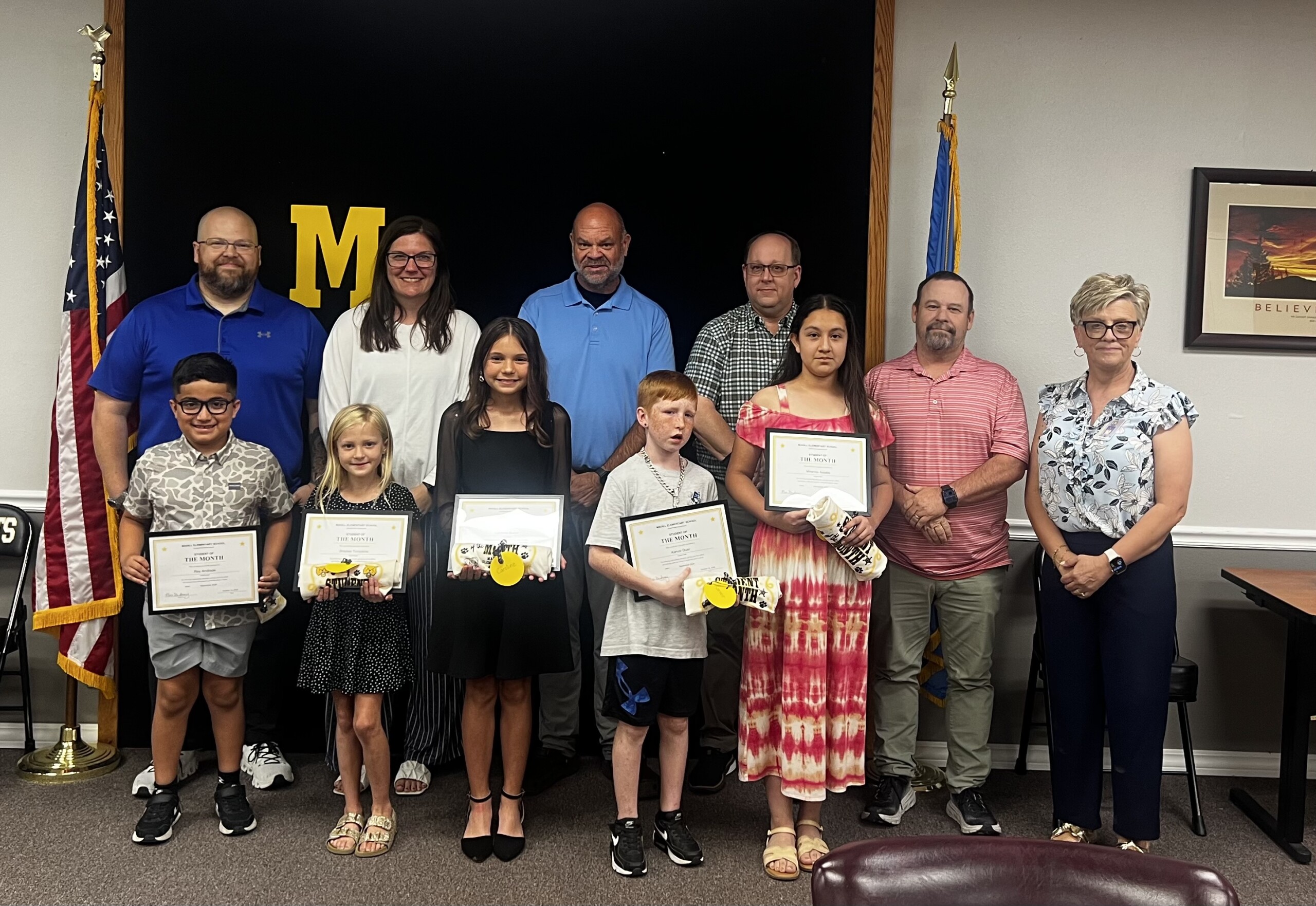 Elementary Students of the Month with board members